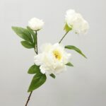 Three white silk peony heads with green leaves for elegant floral arrangements and home decor.