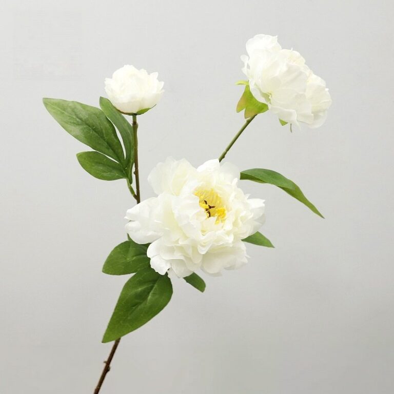 Three white silk peony heads with green leaves for elegant floral arrangements and home decor.