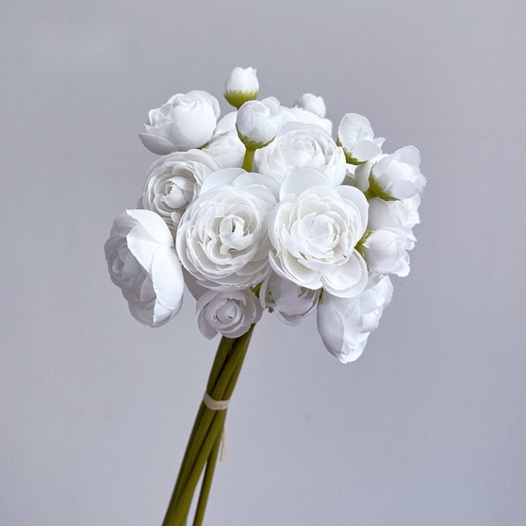 Elegant white silk lotus and rose bouquet for wedding decor or lasting home centerpiece.