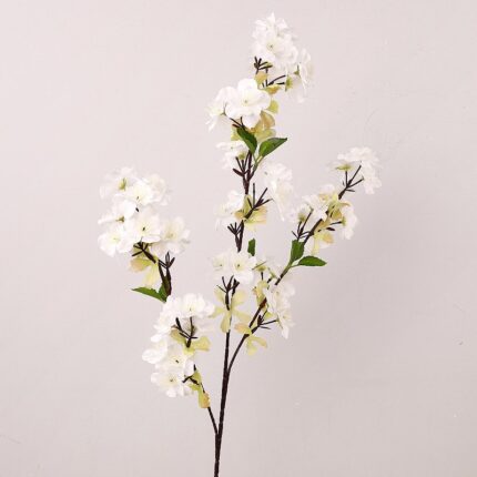 Artificial silk cherry blossoms arrangement for spring decor and decoration.