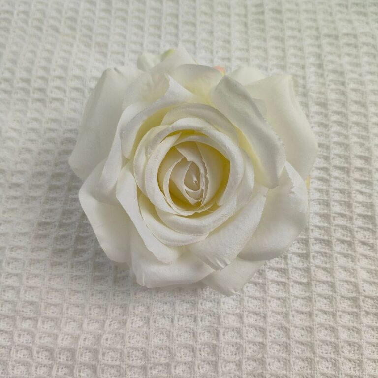 Artificial white silk rose head (10 cm) for permanent floral decor and home accents.