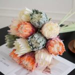 Bouquet of realistic artificial King Protea blooms perfect for wedding centerpieces and home decor.