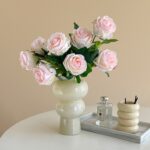Realistic pink rose bouquet on faux flower stems, ideal for wedding or home décor.