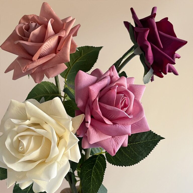 Realistic bouquet of artificial rose flowers perfect for wedding or home decor.
