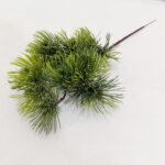 Realistic green faux foliage cluster, ideal for artificial wedding flowers or sophisticated home decor staging.