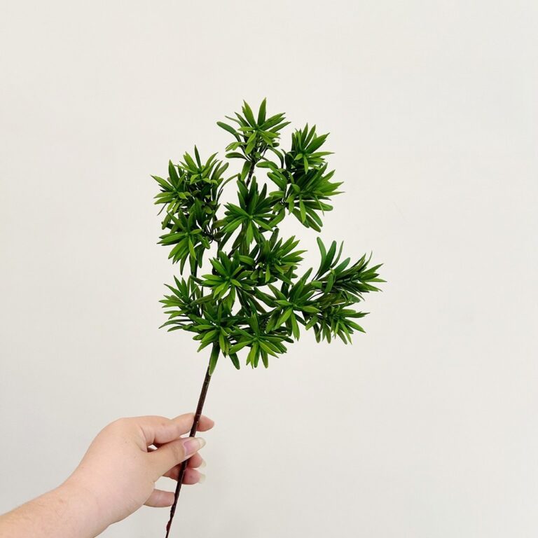 Realistic faux flower stems perfect for adding everlasting greenery to wedding or home decor.