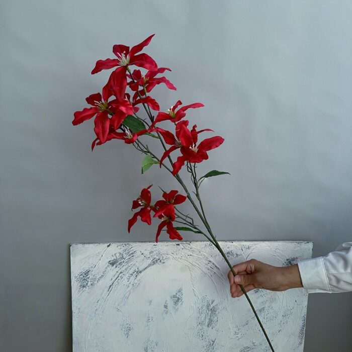 Silk artificial lily bouquet featuring 12 deep red flower heads for home decor arrangement.
