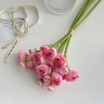 Silk Lotus bouquet of pink roses with green stems, tied with natural twine.