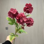 Artificial silk hydrangea bouquet featuring four heads of deep burgundy pink flowers.