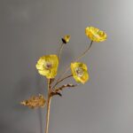 Artificial silk corn poppy bouquet with vibrant yellow blooms on delicate faux stems.