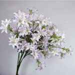Artificial silk lilies bouquet featuring white and soft lavender blooms for decoration