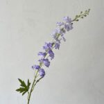 Realistic faux silk Delphinium floral branch for DIY arrangements and decor.