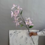 Artificial pink silk lilies, 12 heads, perfect for floral home decor accents.