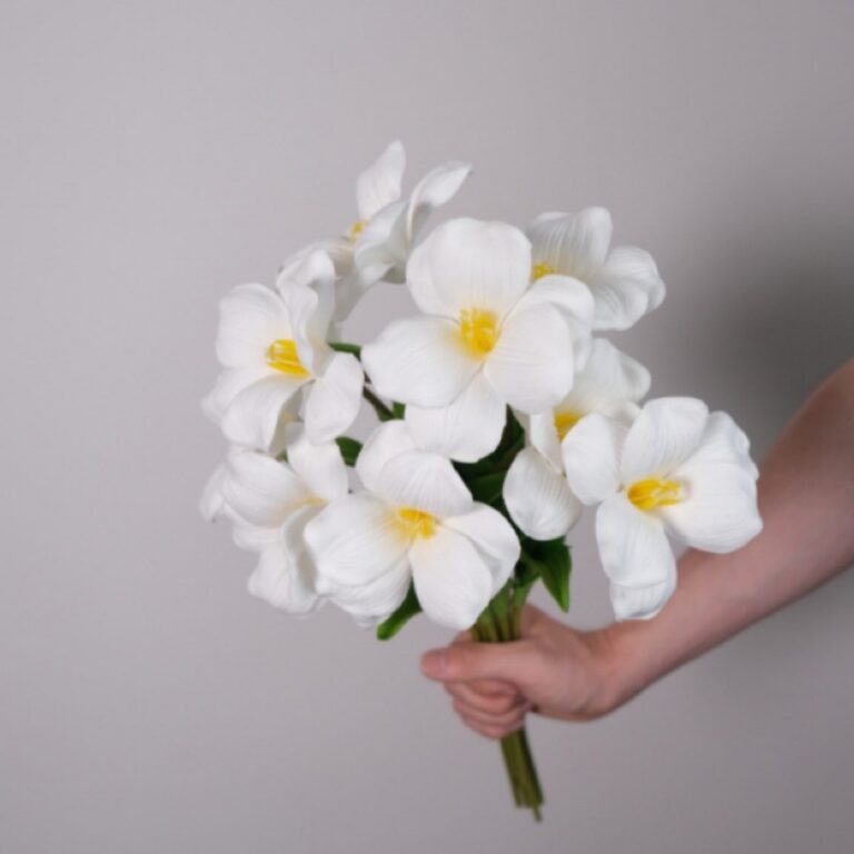 White faux floral bouquet of realistic star-shaped blooms, perfect gift decor.