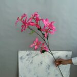 Artificial pink lily bouquet featuring 12 heads for home decor display.