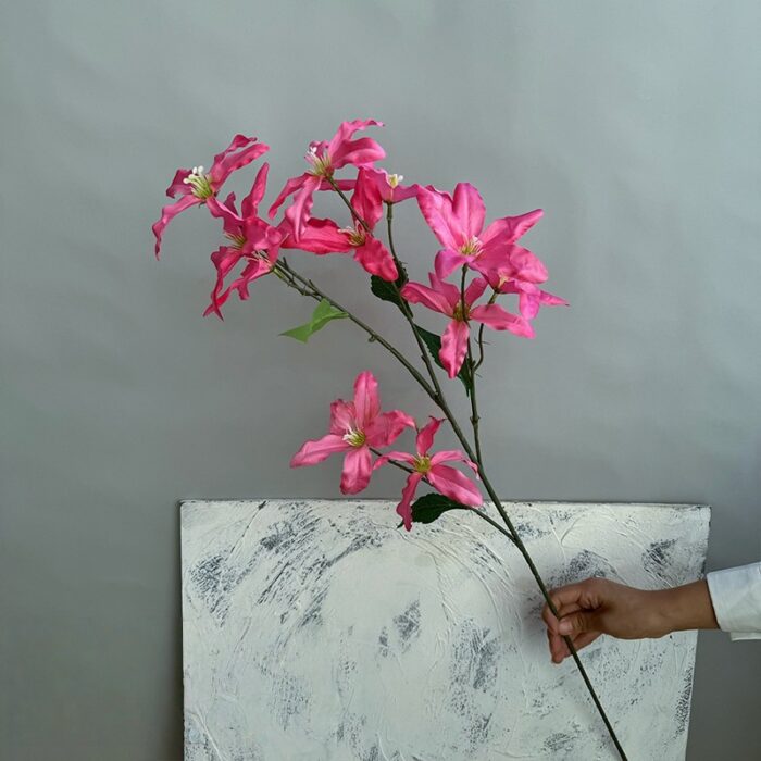 Artificial pink lily bouquet featuring 12 heads for home decor display.