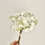 Realistic silk jasmine bouquet with white faux flowers, perfect for artificial floral decor.