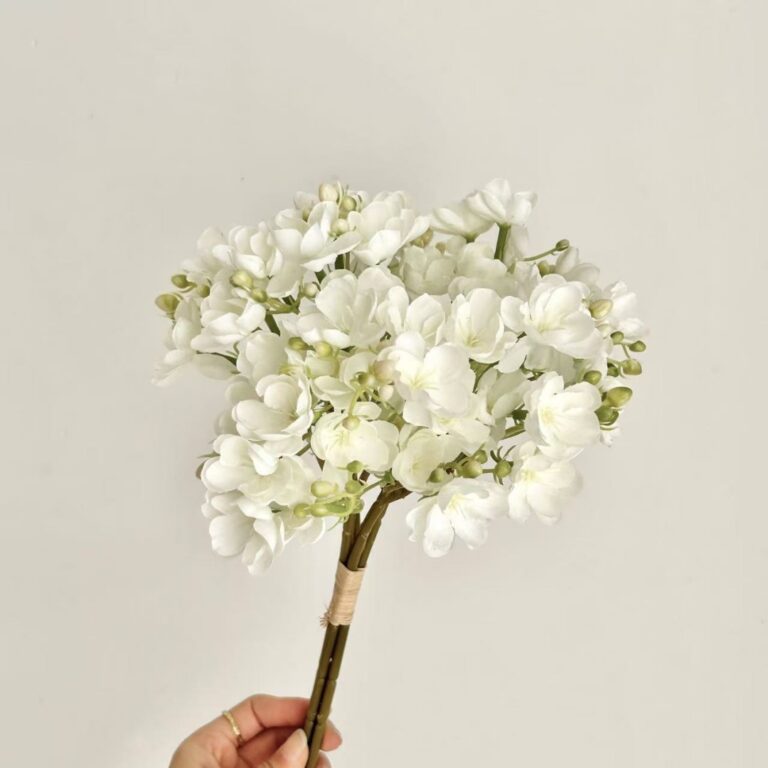 Realistic silk jasmine bouquet with white faux flowers, perfect for artificial floral decor.