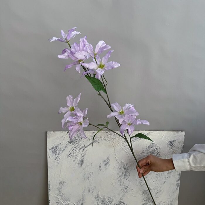 Decorative silk lily bouquet featuring 12 artificial lavender flowers for home decor.
