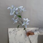 Realistic silk lilies bouquet featuring 12 heads of light blue artificial flowers for decor