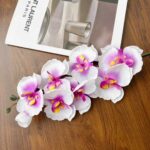Realistic artificial orchid bouquet featuring white and purple blooms, perfect for home decor.