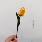 Realistic artificial yellow tulip flower stem for wedding centerpieces or home decor.