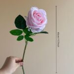 Realistic pink artificial rose stem perfect for wedding centerpieces or home decor arrangements.