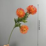 Three heads of realistic faux pincushion flowers perfect for wedding artificial flowers or home decor.
