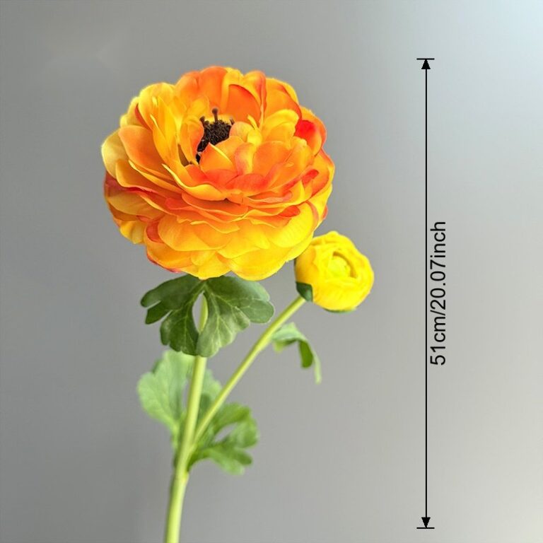 Realistic artificial silk lotus flowers in vibrant yellow and orange hues, arranged on a stem.