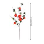 Faux pomegranate branch with lush green foliage accents for seasonal decoration.