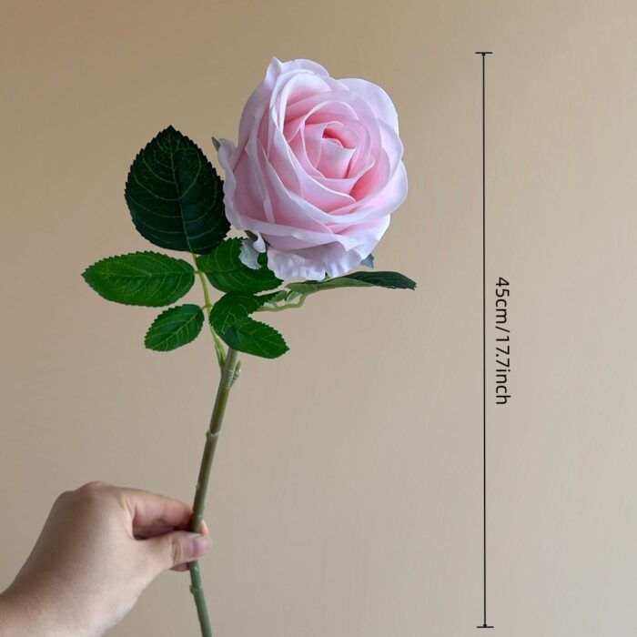 Realistic pink artificial rose stem perfect for wedding centerpieces or home decor arrangements.