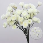 Beautiful bouquet of six white faux silk roses for elegant home decor.