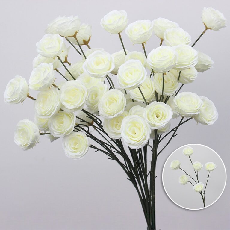 Beautiful bouquet of six white faux silk roses for elegant home decor.