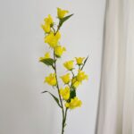 Bright yellow silk bluebells bouquet arrangement against a clean white background.