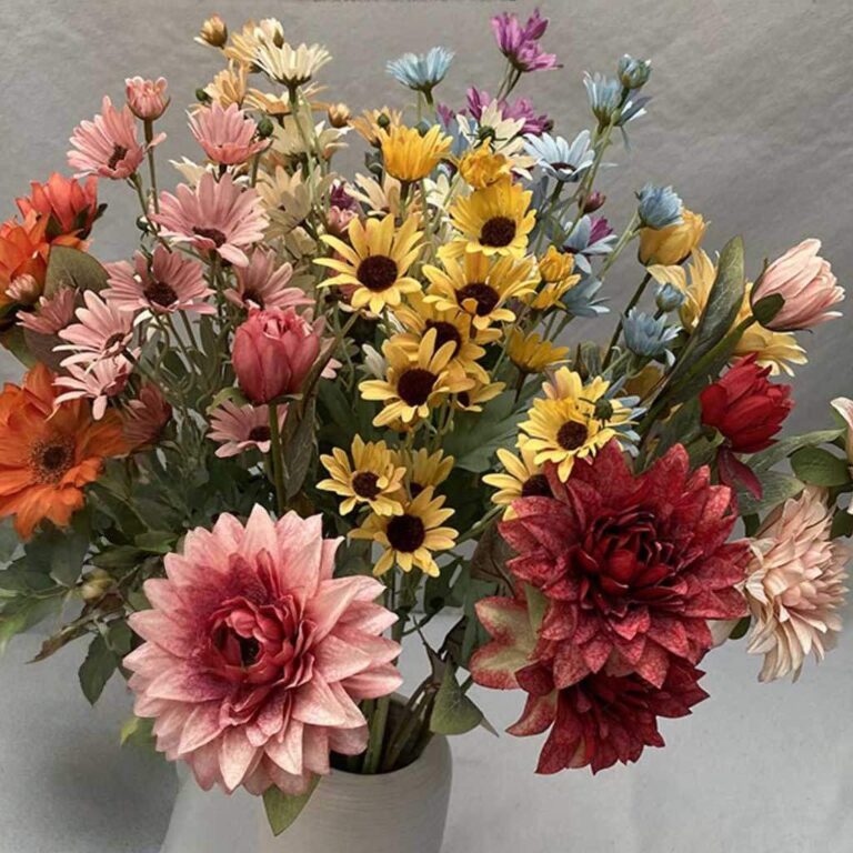 Vibrant bouquet of realistic silk daisies and mixed colored blooms for wedding or home decor.
