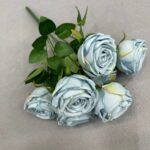 Bunch of artificial silk roses with leaves, perfect for home decor and everlasting bouquets.
