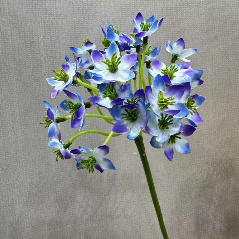 Artificial flower display of blue silk Agapanthus blooms on stems for home decoration.