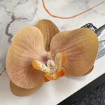 Realistic 3D silk orchid head artificial flower replica for home decor or arrangements.