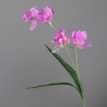 Artificial flower display of pink freesias, a vibrant silk flower decoration.