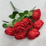 Bouquet of 7 artificial red silk roses with vibrant green foliage