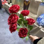 Six vibrant red silk roses bouquet, perfect artificial flower decor for home.