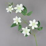 Artificial white clematis flowers arranged on stems, perfect silk flower decor.