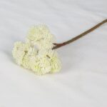 Artificial flower branch with clustered white blossoms, perfect for lasting home floral decor.