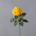 Realistic yellow artificial flower rose bloom on a stem, perfect for silk floral decor.