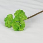 Cluster of vibrant green artificial silk flowers on a stem.