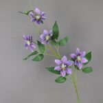 Realistic artificial flower bouquet featuring purple Clematis blossoms made from luxurious silk fabric.