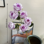 Six heads of pink silk roses perfect for arrangements or decorative artificial flower displays.