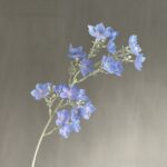 Flocking blue faux wedding flowers spray, offering a real touch artificial flower accent for bouquets.