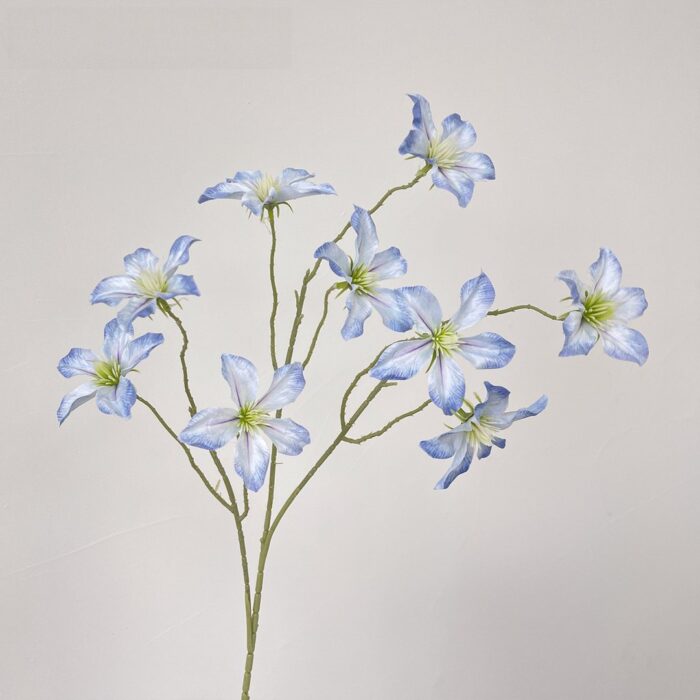Silk clematis floral arrangement, a beautiful faux wedding flower display.