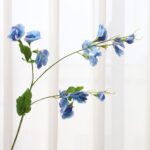Realistic blue sweet pea artificial flower spray perfect for floral arrangements and wedding decor.